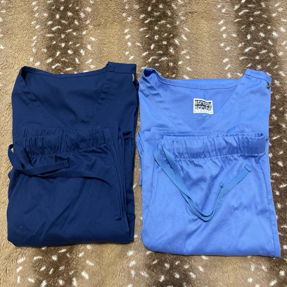 2 sets of medium scrubs